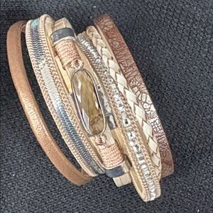 Elegant Multi-Layered Bracelet with Gold and Silver Accents